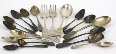 A collection of various silver cutlery