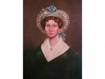 Anonymous (19thC school). Half length portrait of a lady wearing a green