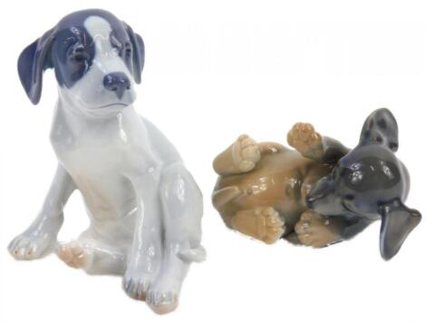 A Royal Copenhagen porcelain model of a seated puppy