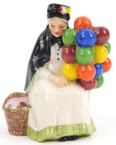 A Royal Doulton Miniature Street Vendors Figure