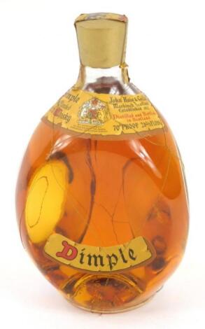 A bottle of Dimple Whisky