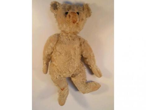 An early 20thC Steiff teddy bear with shaved snout