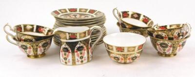 A Royal Crown Derby 1128 pattern part tea service