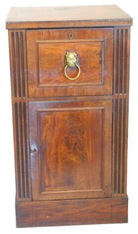 An early 19thC mahogany and ebony strung dining room cabinet