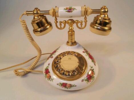 A Royal Albert "Old Country Roses" parlour telephone with an oval composition