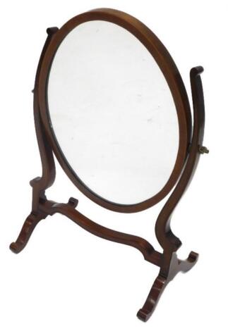 A mahogany swing frame mirror