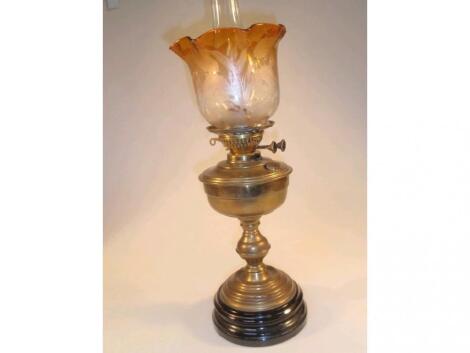 A Victorian brass oil lamp with double burner