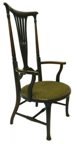 An Edwardian mahogany armchair