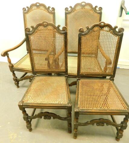 A set of four ebonised beech Continental style armchairs