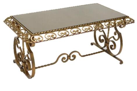 A continental gilt wrought iron rectangular coffee table in the manner of Edgar Brandt