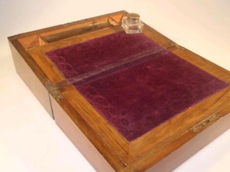 A 19thC rosewood writing box with a brass shield