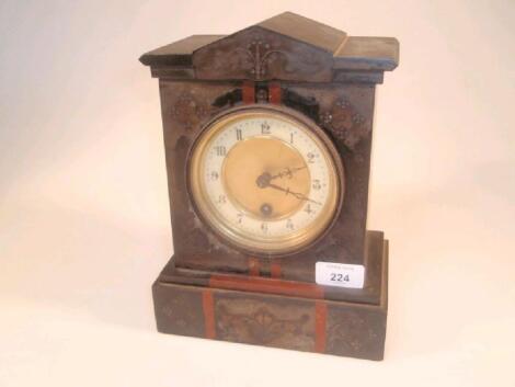 A 19thC slate and marble mantel clock of architectural outline