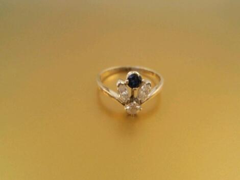 A stone set ladies dress ring of a small round brilliant cut diamond