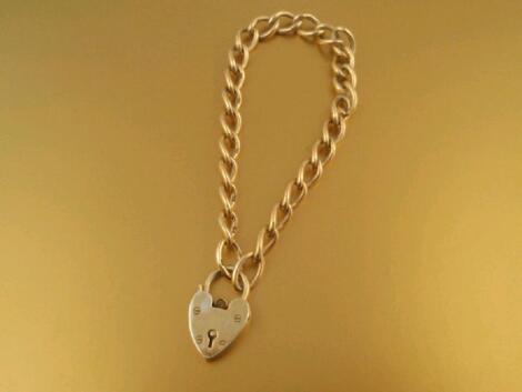 A 9ct gold curb link bracelet with padlock clasp