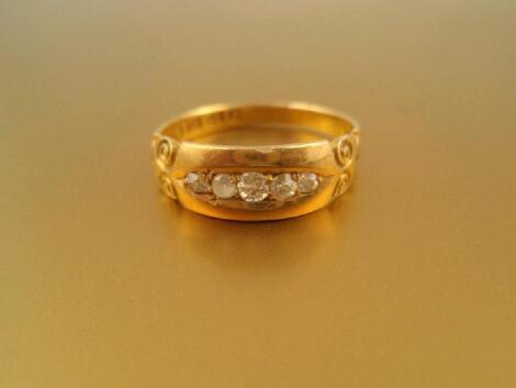 A Victorian five stone diamond set gypsy style ring