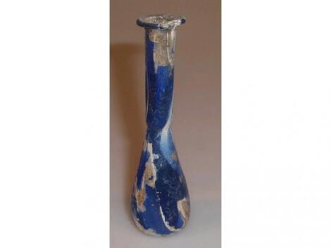 A Roman blue and opaque white marbled glass perfume bottle or unguentarium