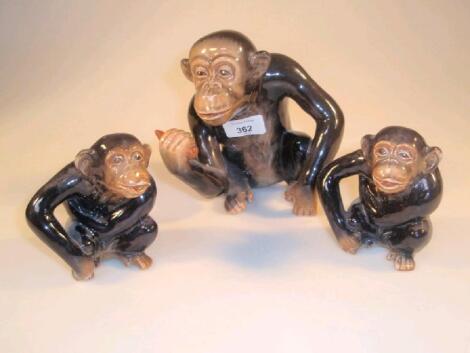 A set of three Sylvac monkeys in playful poses