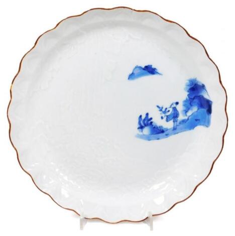 A Japanese circular moulded saucer dish