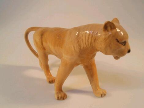 A Beswick figure of a lioness