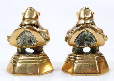 A pair of polished bronzed desk seals - 4