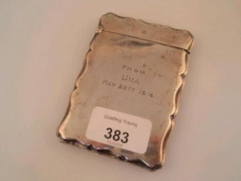 A George V silver card case by James Dixon & Son of plain design with bracketed rim