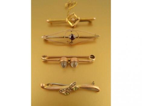 Four bar brooches set with various stones