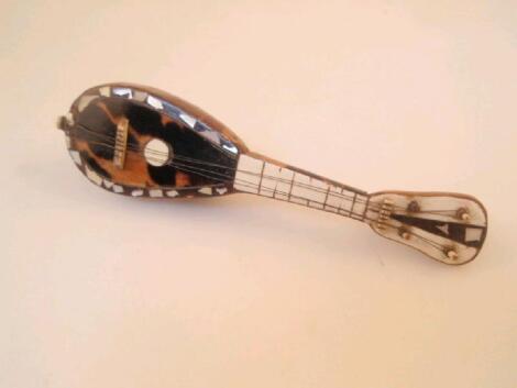 A miniature tortoiseshell covered model of a lute