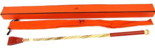 A boxed Hermes riding crop