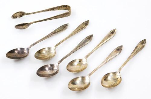 A seven piece George VI silver teaspoon and sugar bow set