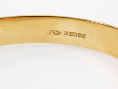 A 9ct gold bangle - 2