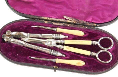 An Edwardian cased part travelling set