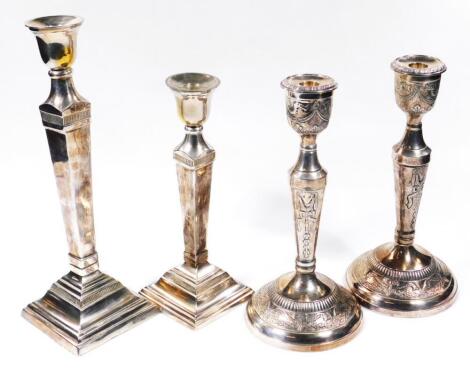 Two pairs of candlesticks