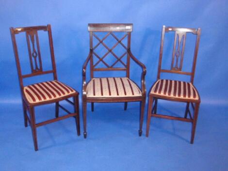 A Harlequin suite of three Edwardian string inlaid bedroom chairs