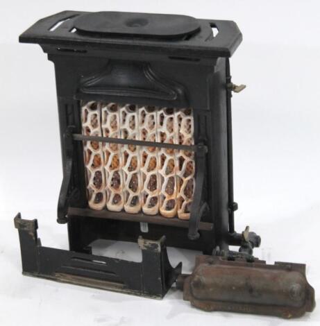 A small Victorian cast iron gas fire