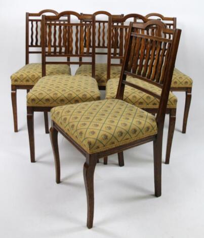 A set of six early 20thC oak dining chairs