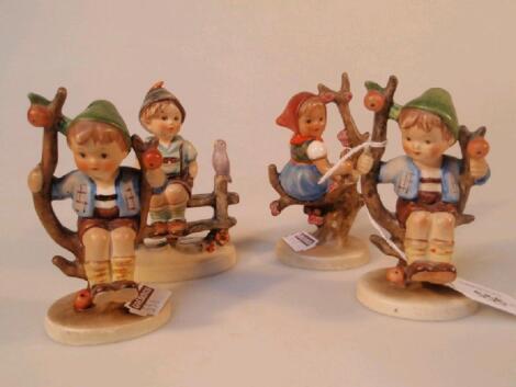 Four Goebel figures.