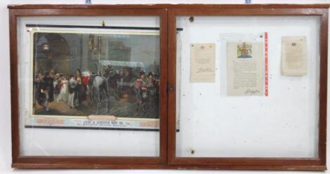 A mid 20thC hanging notice display cabinet