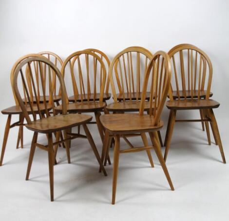 A set of eight mid 20thC Ercol hoop back dining chairs