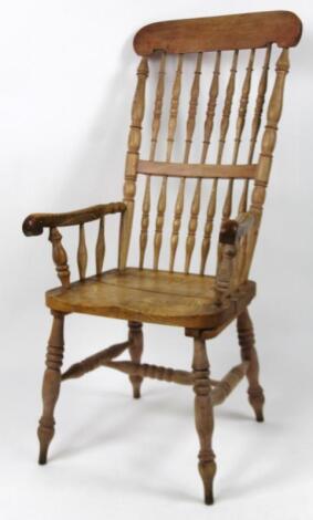 An ash and elm comb back Grandfather chair