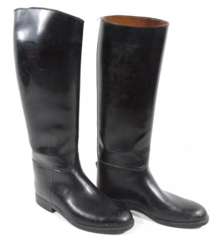 A pair of 20thC black leather riding boots