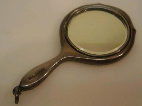 A George V silver miniature hand mirror with yellow guilloche enamel back