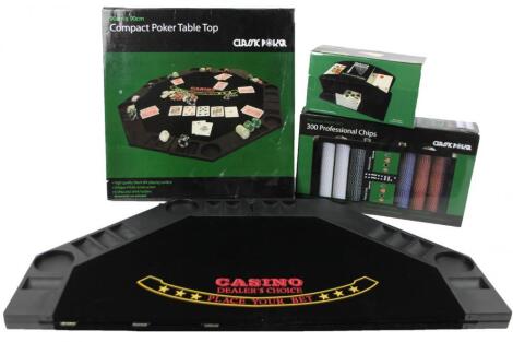 A boxed set of classic poker gaming chips (300)