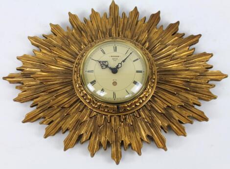 A 20thC retro Smith's sunburst style wall clock