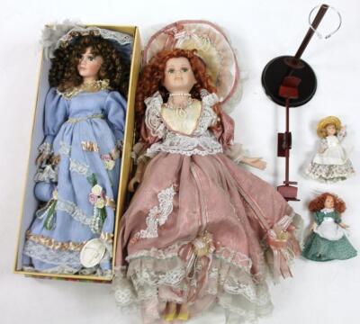 Various porcelain dolls