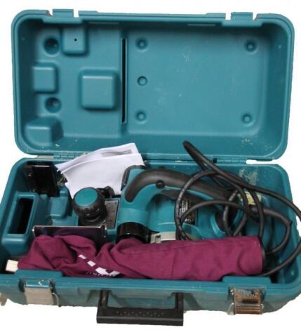 A Makita KP0810K planer cased