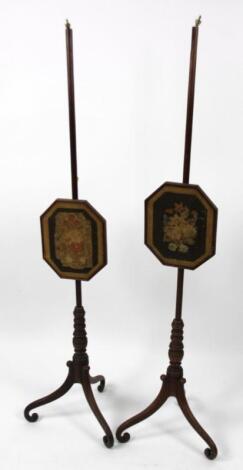 A pair of 19thC mahogany pole screens