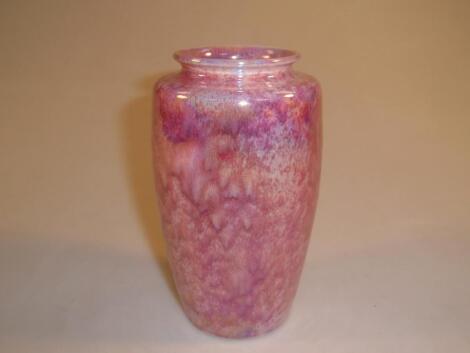 A Ruskin shouldered circular vase painted with a pink lustre glaze