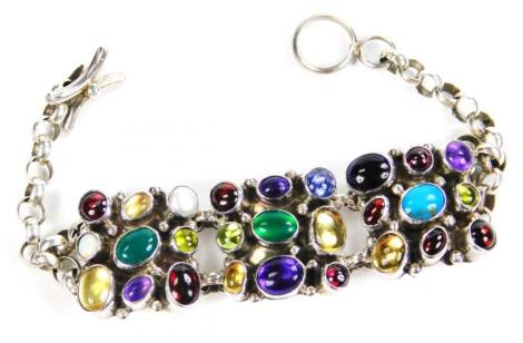 A silver and multi gem stone bracelet