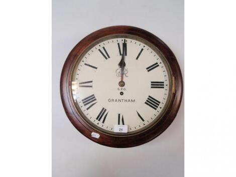 A George V GPO wall clock with single fusing movement and marked GRANTHAM