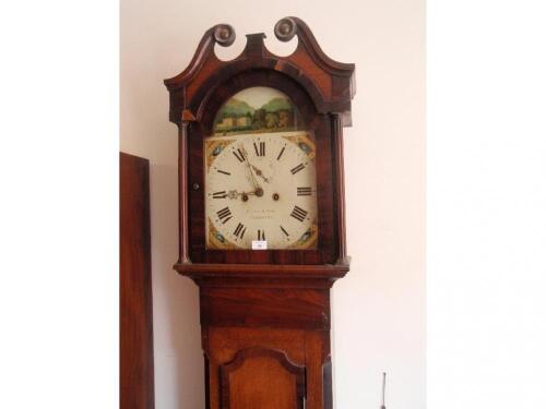 An early 19th century oak and mahogany long case clock with swan neck pillared hood